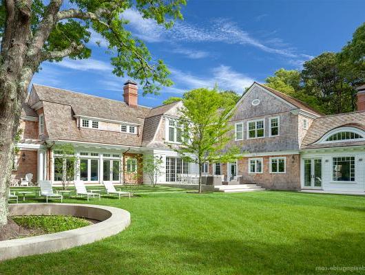 Gambrel Shingle Style Cape home designed by Catalano Architects and constructed by Travis Cundiff Associates, Inc.